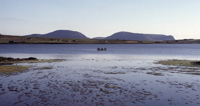 Coastal landscape with boat