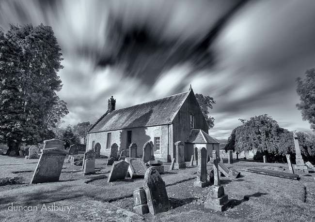 Church with graveyard in foreground