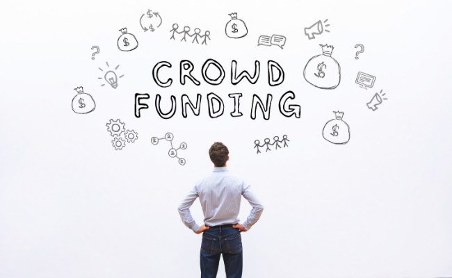 Person looking at Crowd Funding graphic