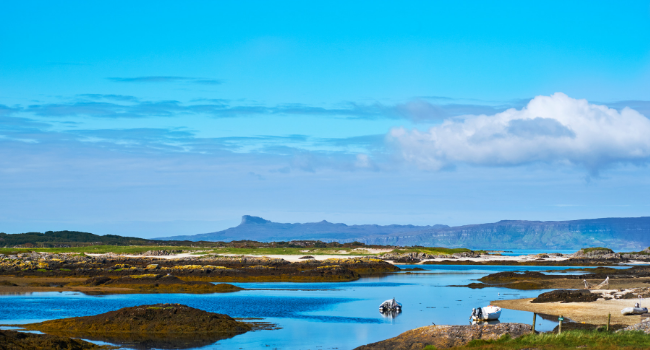 Coastal landscape, with Isle of Eigg in distance
