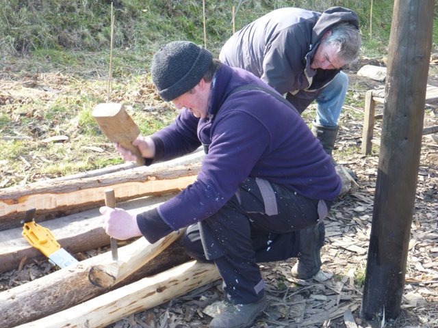 People making timber building