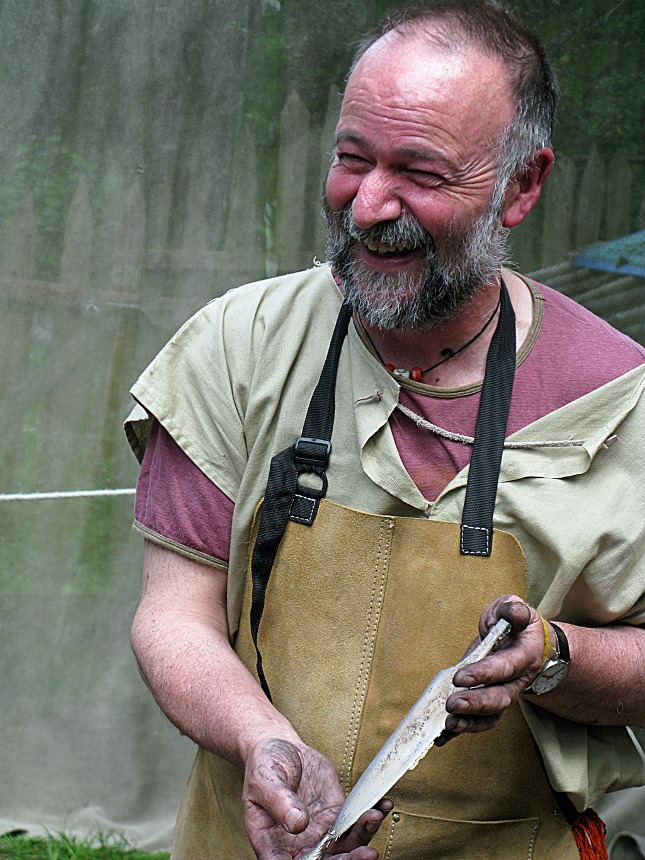 Man holding bronze dagger