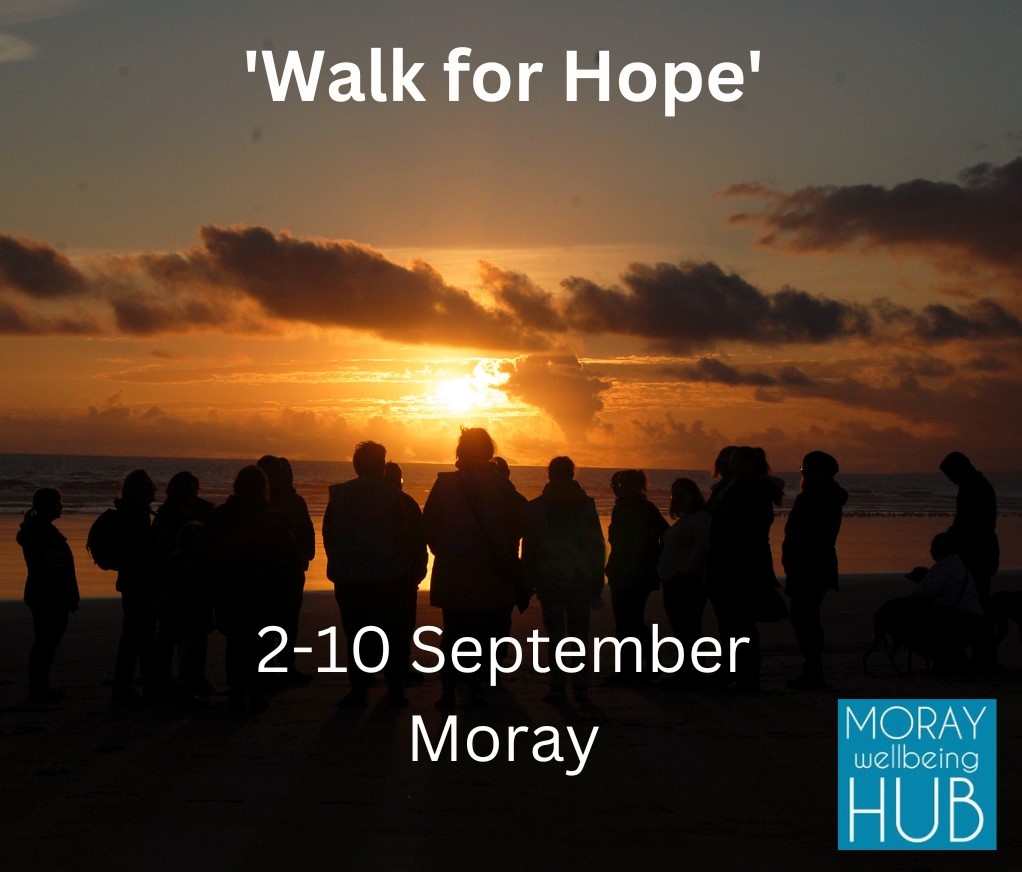 Memorial gathering on beach at dawn