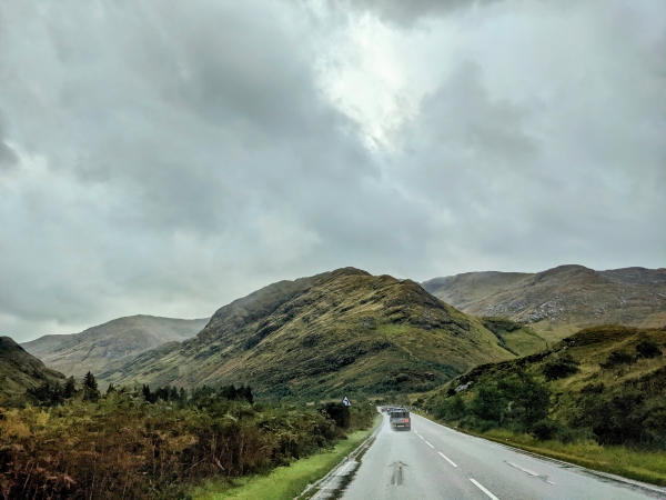 View from vehicle travelling through rural Scottish higliands