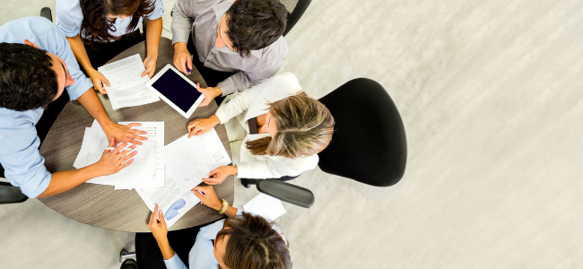 group of business people round table