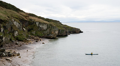Kayak at sea off cliffs at Lossiemouth
