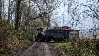 Tractor and trailer on farm track