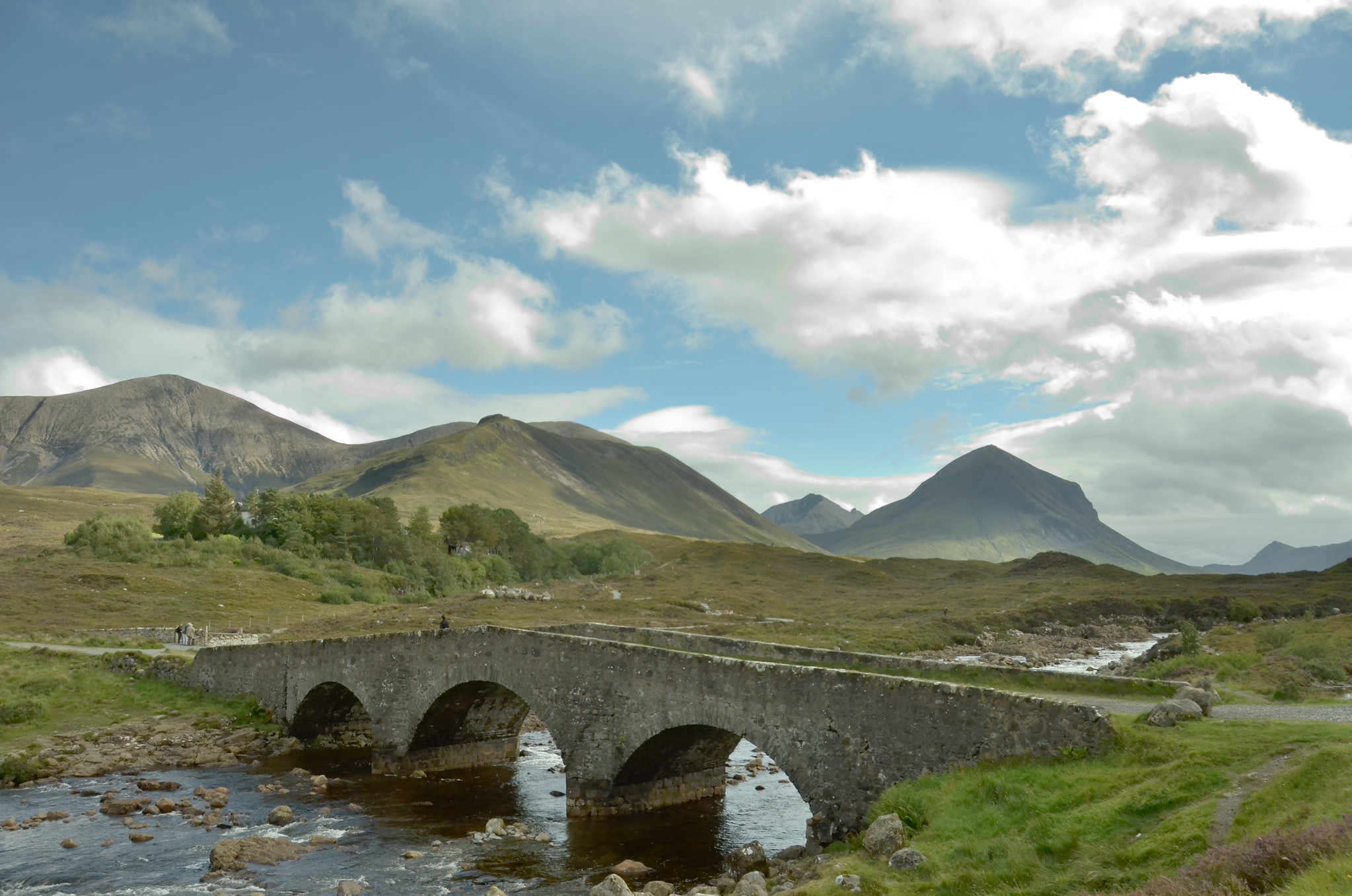 View of Sligachan Bridge, Skye with distant mountains in the background