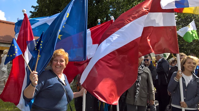 people holding flags at Estonia Rural Parliament