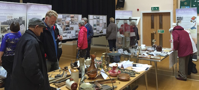 People looking at heritage exhibition 
