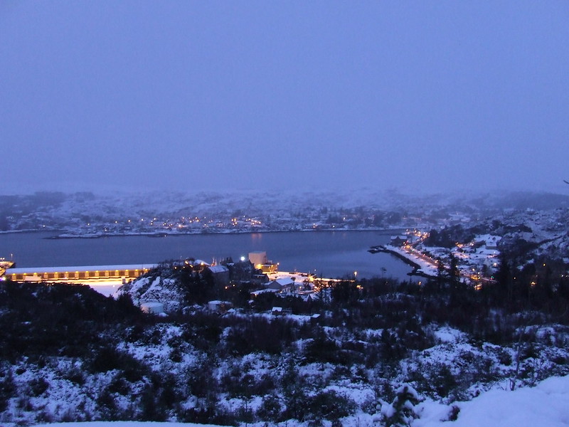 Snow covered Lochinver at night