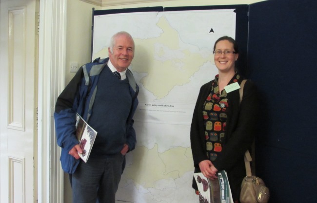 People standing in front of map of Kelvin Valley and Falkirk LEADER areas
