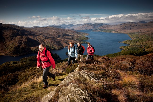 People walking in Loch Lomond and the Trossachs National Park, photo courtesy of Loch Lomond and the Trossachs National Park