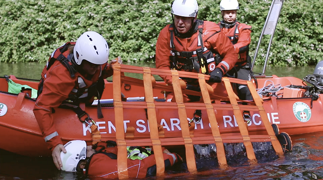 search and rescue team using lifeboat 