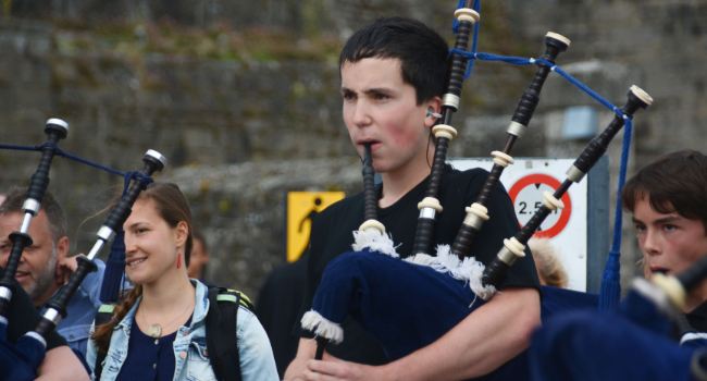 person playing bagpipes
