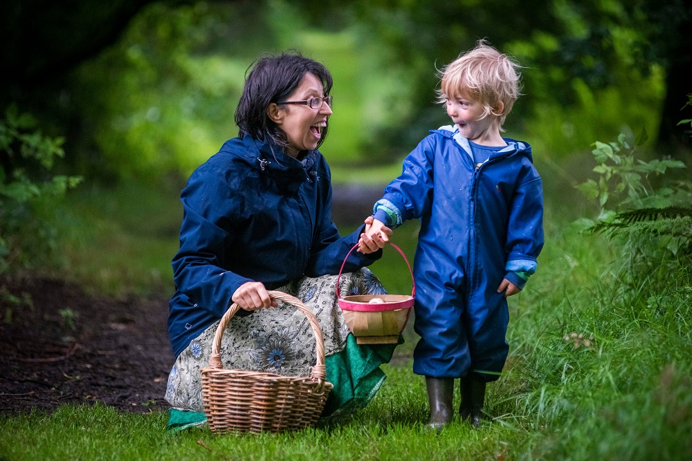 Woman and child on a foraging walk