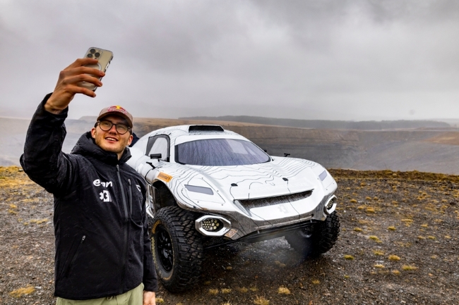 Kevin Hansen Extreme E race driver taking selfie at Glenmuckloch opencast site (photo credit - Extreme E)