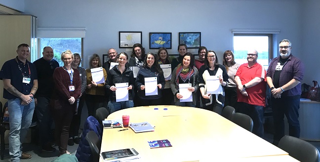 group photo of Mental Health First Aid training participants