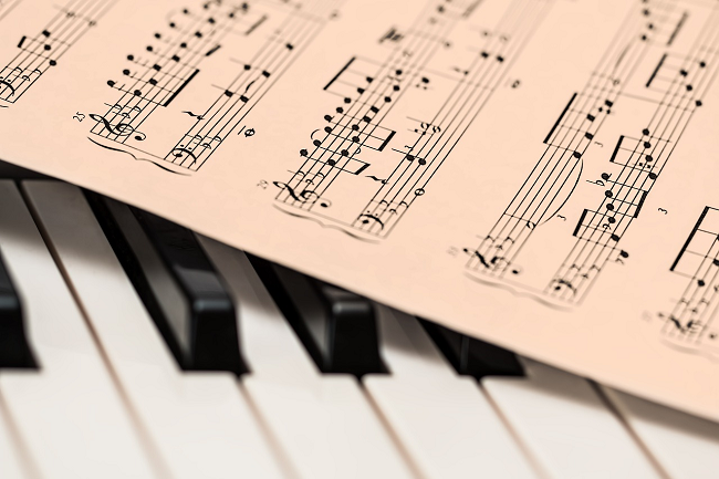 image of piano keys and sheet music