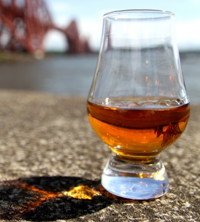Glass with whisky in it