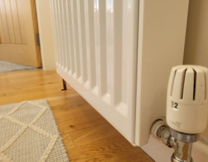 Close up of radiator heating control in a domestic setting