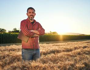Agronomist in wheat field iStock
