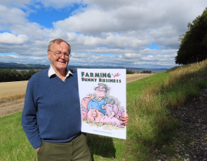 Andrew Arbuckle pictured with the cover of new book – Farming is Still a Funny Business.