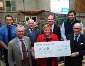 Group photo with giant cheque