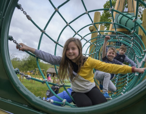 Children playing in play park
