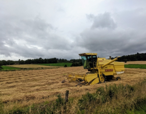 Combine harvester in field, Aberdeenshire