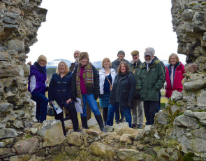 Group photo of people on Project Visit at Castle Roy