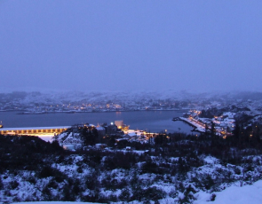 Snow covered Lochinver at night