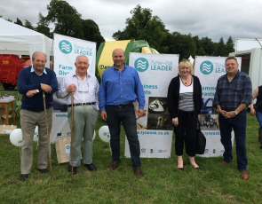 Members of the public and Local Action Group members standing next to Tyne Esk LEADER banners at the Dalkeith show