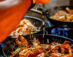 seafood being cooked in hot pan