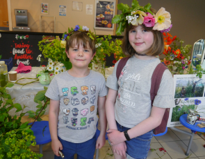 Two young attendees wearing their flower crowns at the Alive with local food launch