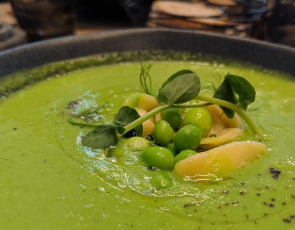 Green pea soup with garnish