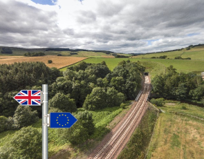 Border railway line with brexit sign