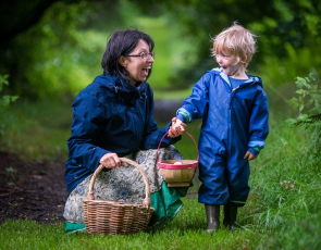 Woman and child on a foraging walk
