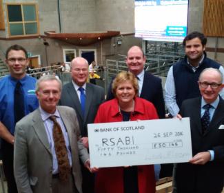 Group photo with giant cheque