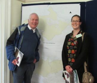 People standing in front of map of Kelvin Valley and Falkirk LEADER areas