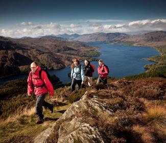 People walking in Loch Lomond and the Trossachs National Park, photo courtesy of Loch Lomond and the Trossachs National Park