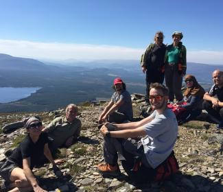 Volunteers taking a break at the top of the Meall aBhuachaille in the Cairngorms