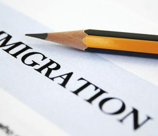 pencil with word 'immigration'