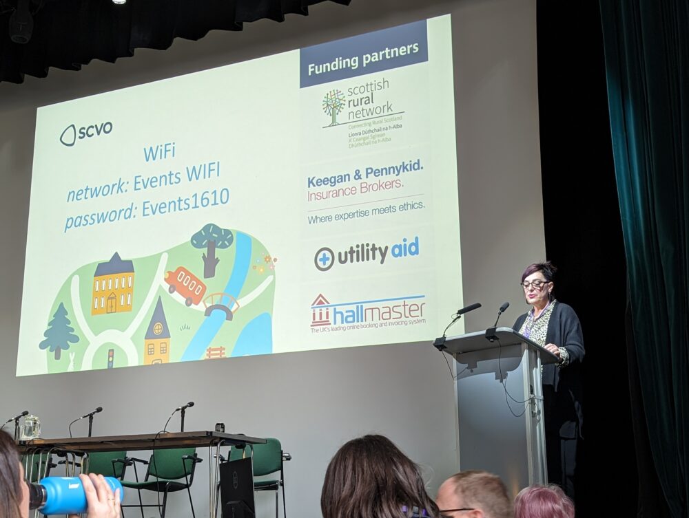 Speaker at podium at the Heart of the community: village halls conference 2024